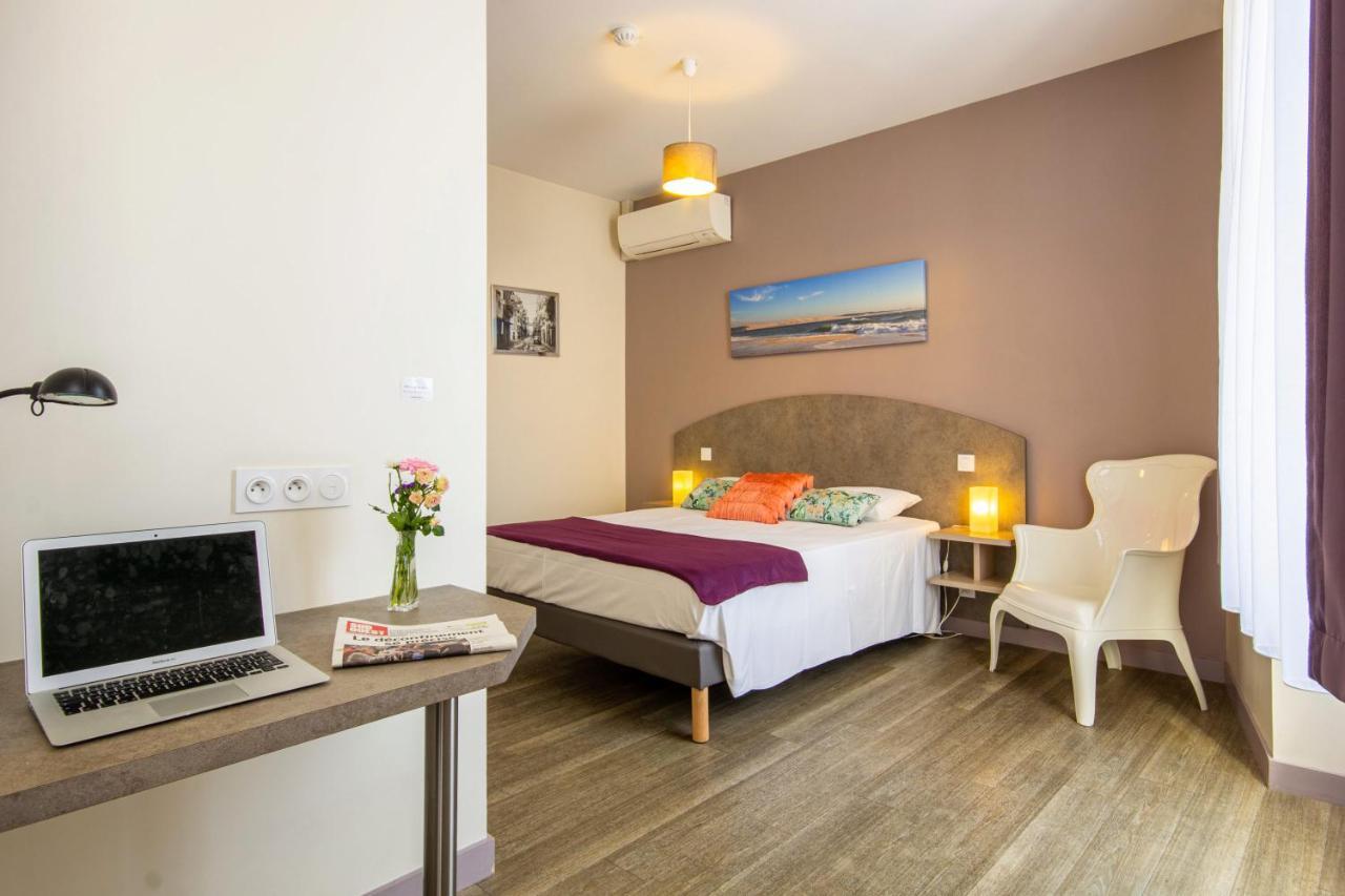 Cit'Hotel Le Commerce Saujon Buitenkant foto
